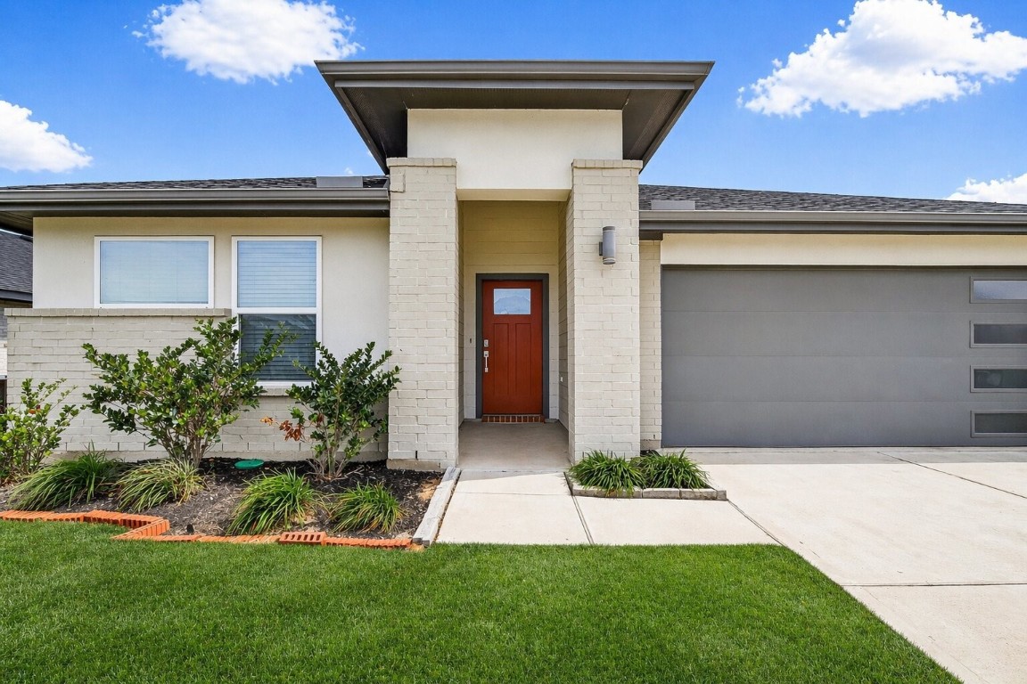 3919 Sparkman Lane Katy, TX 77494 - Photo 2 of 38 Please note: The lawn in this image has been digitally enhanced to appear green and lush. The color has been adjusted for visual representation.