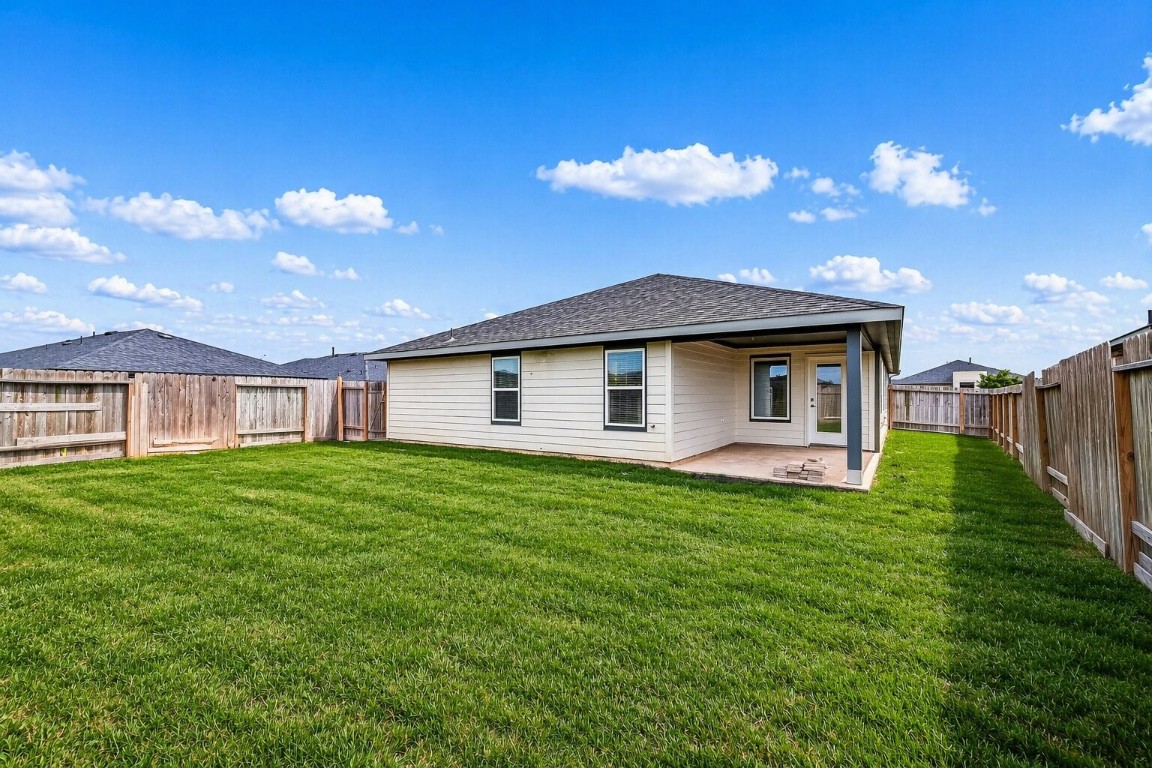 3919 Sparkman Lane Katy, TX 77494 - Photo 38 of 38 Please note: The lawn in this image has been digitally enhanced to appear green and lush. The color has been adjusted for visual representation.