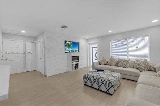 a living room with furniture and a couch