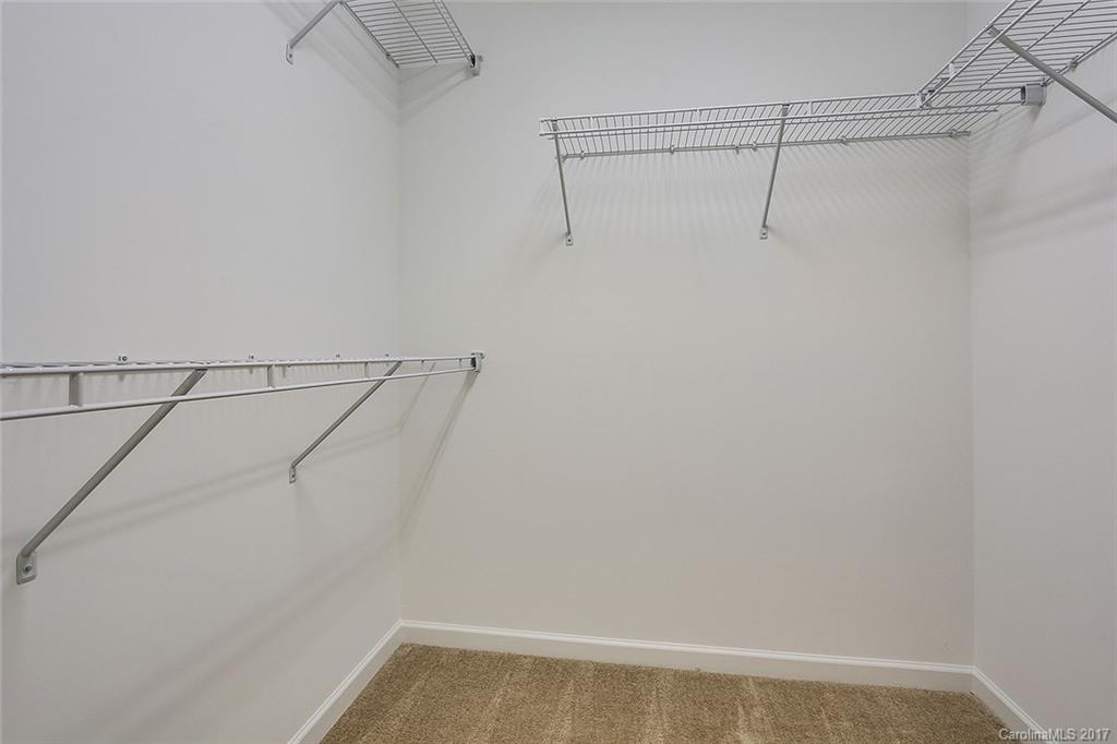 1128 Roderick Drive, Unit 70 FALKNER B Fort Mill, SC 29708 - Photo 14 of 20 a view of a room with racks on the wall