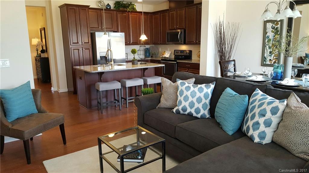 1128 Roderick Drive, Unit 70 FALKNER B Fort Mill, SC 29708 - Photo 16 of 20 a living room with furniture kitchen view and a window