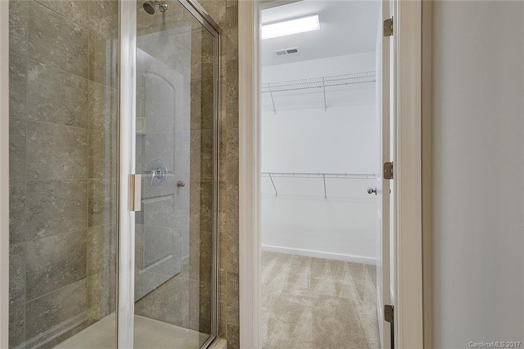 1128 Roderick Drive, Unit 70 FALKNER B Fort Mill, SC 29708 - Photo 10 of 20 a bathroom with a glass shower door