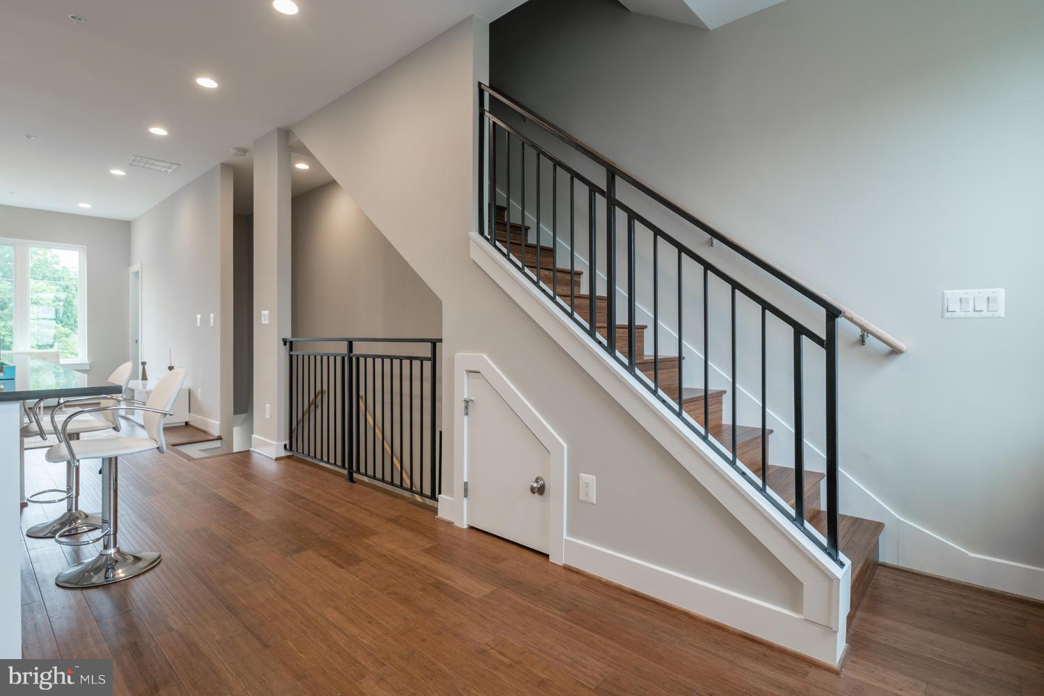 1007 Girard Street Northwest, Unit B Washington, DC 20001 - Photo 10 of 30 a view of staircase with white walls and windows