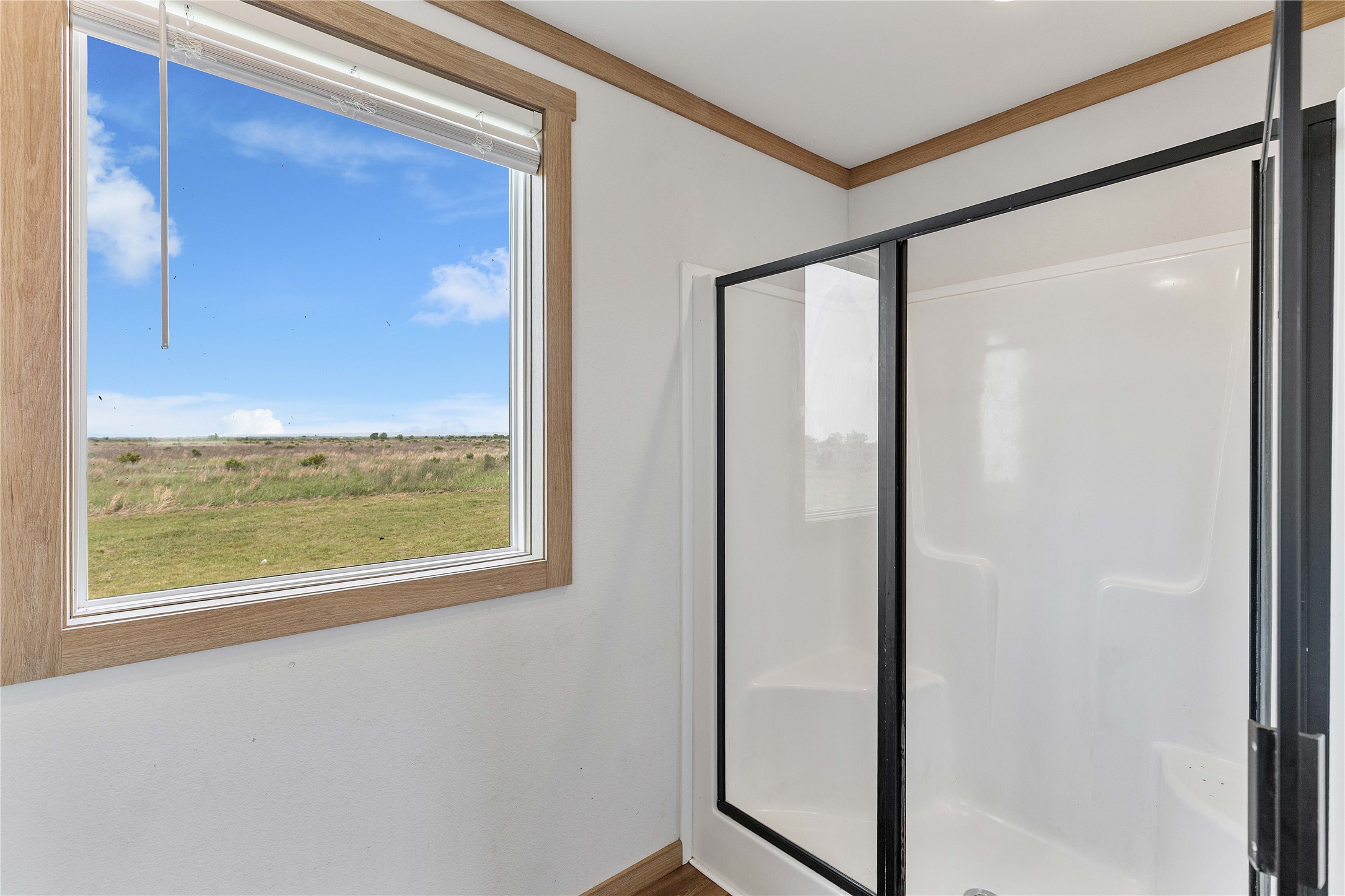 21550 Wilber Road Winnie, TX 77665 - Photo 21 of 28 a view of an empty room and window