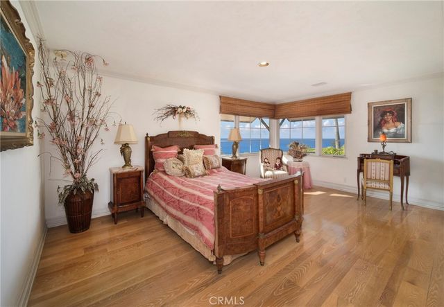 a view of a lake with a building in the background