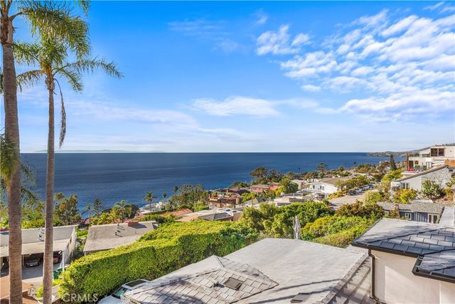 a view of a yard and ocean view