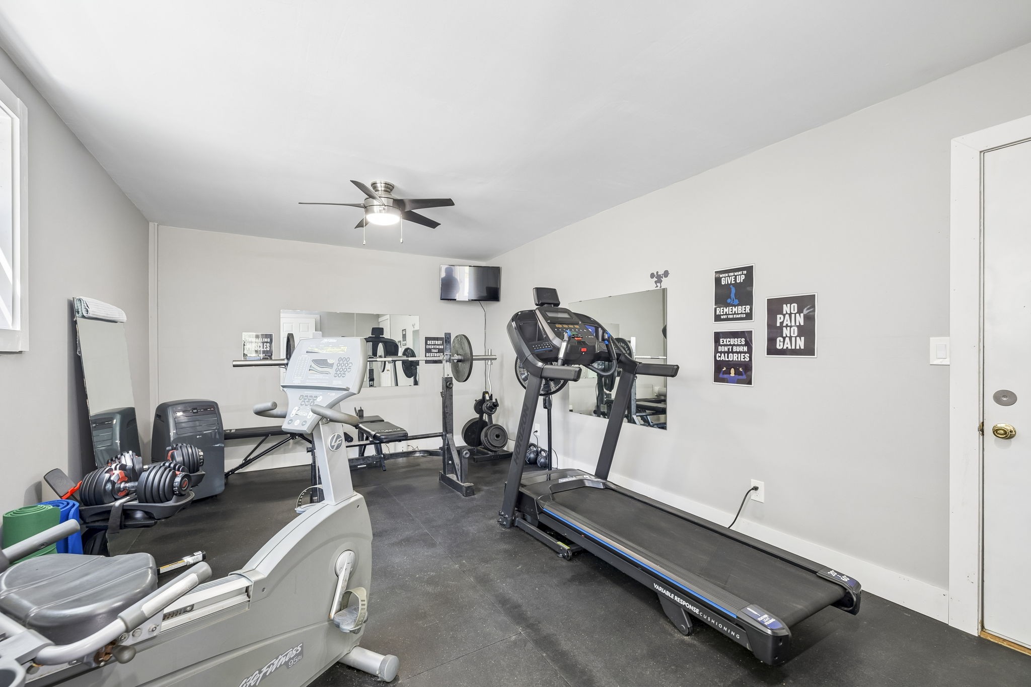 660 Allisona Road Eagleville, TN 37060 - Photo 42 of 87 a room with gym equipment and a view of living room