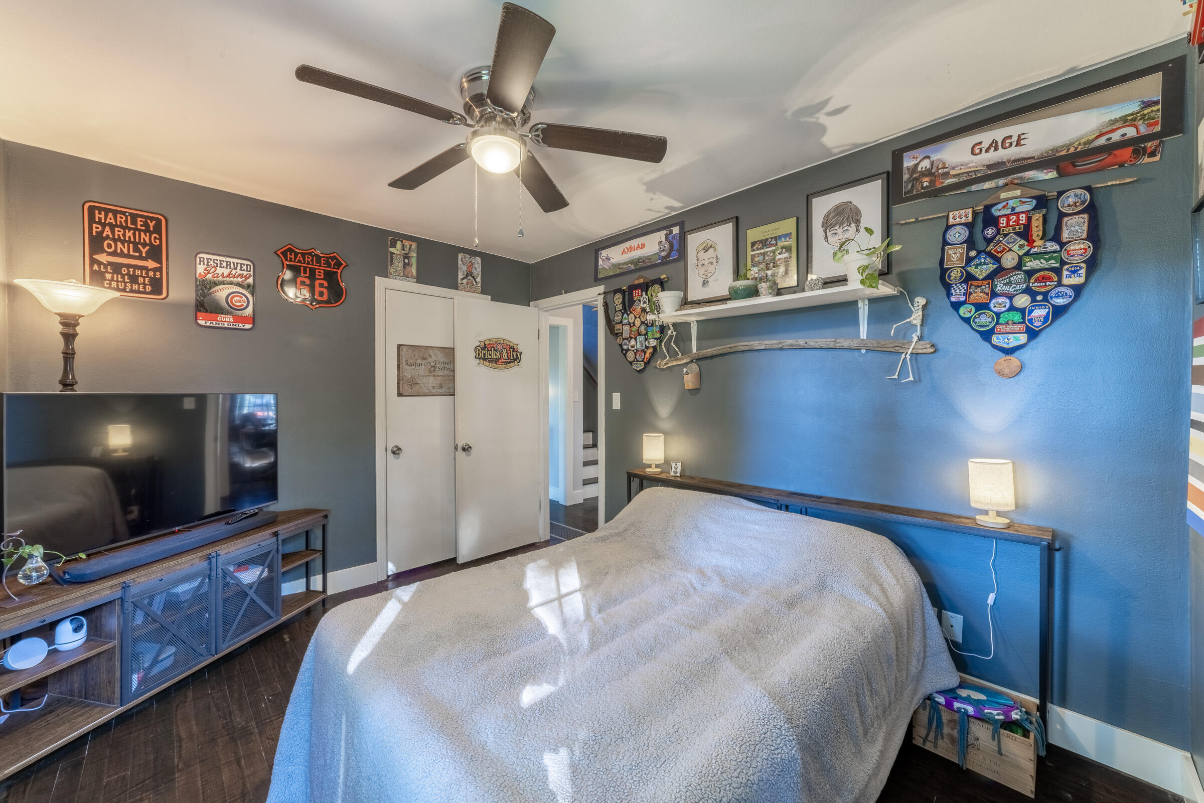 508 West Morgan Avenue Chesterton, IN 46304 - Photo 17 of 38 a bedroom with a bed and a flat screen tv