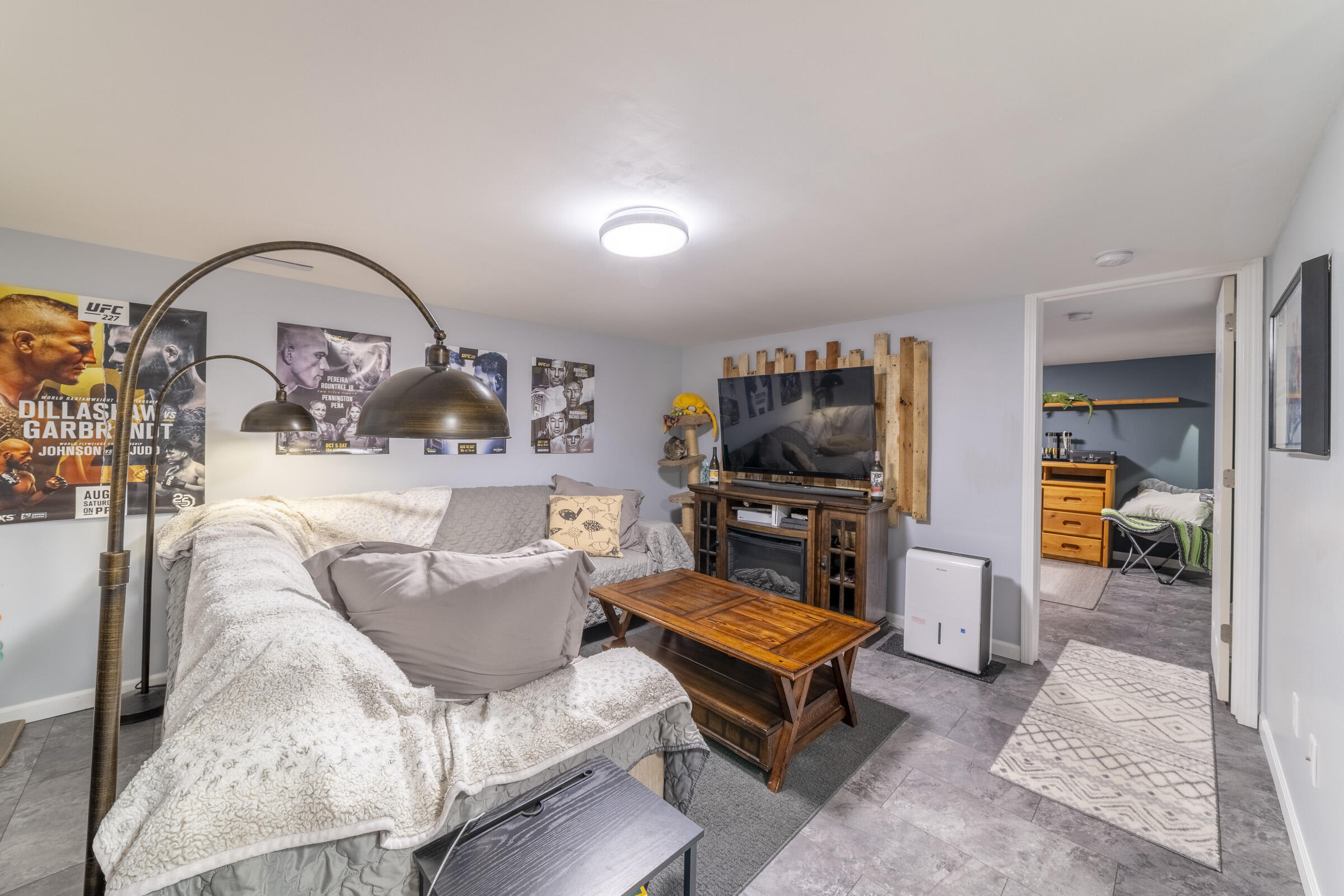 508 West Morgan Avenue Chesterton, IN 46304 - Photo 27 of 38 a living room with furniture a rug and a flat screen tv