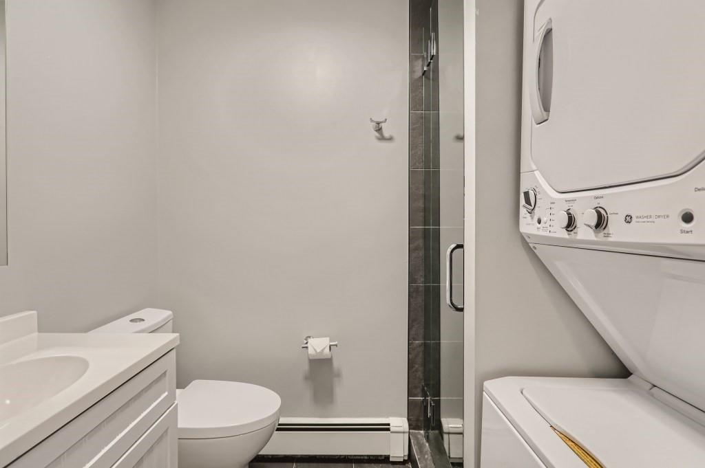 180 Evergreen Road, Unit 204 Dillon, CO 80435 - Photo 9 of 13 a bathroom with a toilet sink and a mirror