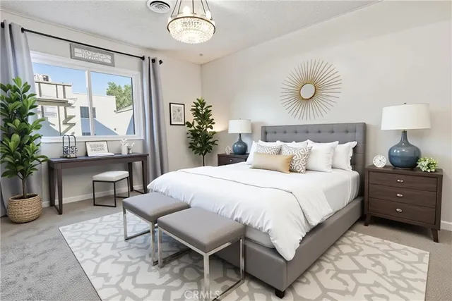 a bedroom with a bed and window