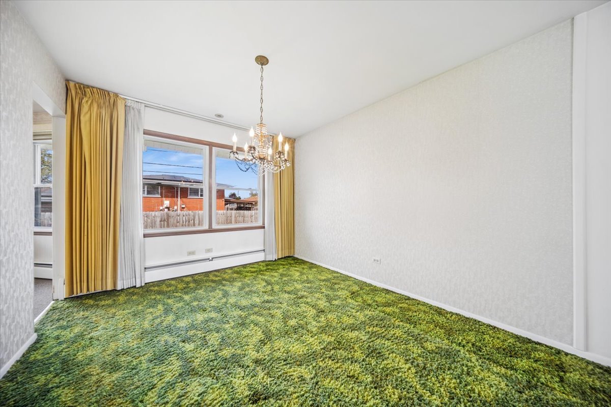 2316 185th Place Lansing, IL 60438 - Photo 7 of 21 a view of an empty room and window
