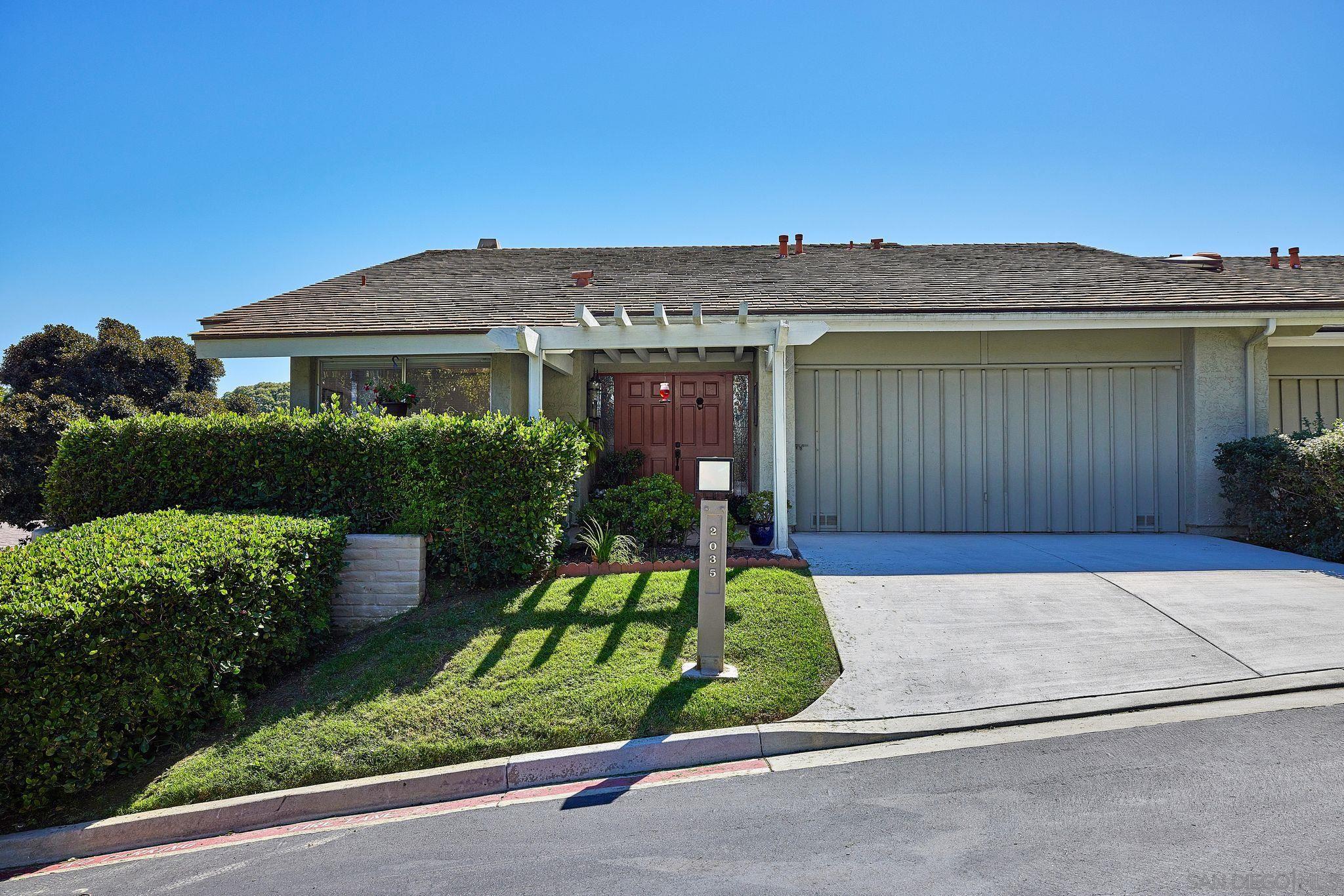 a front view of house with yard