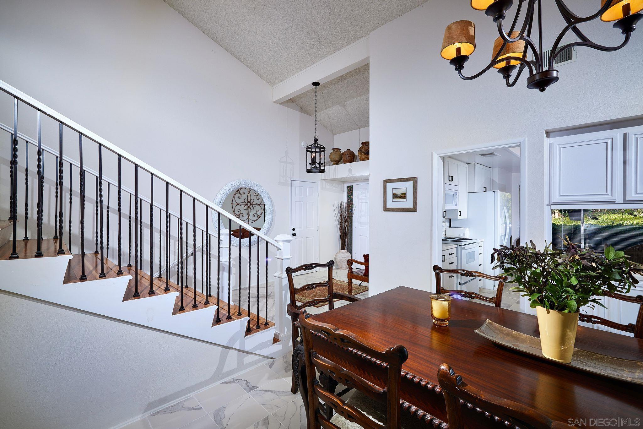 2035 Caminito Circulo Sur La Jolla, CA 92037 - Photo 8 of 22 a bedroom with a bed and a window