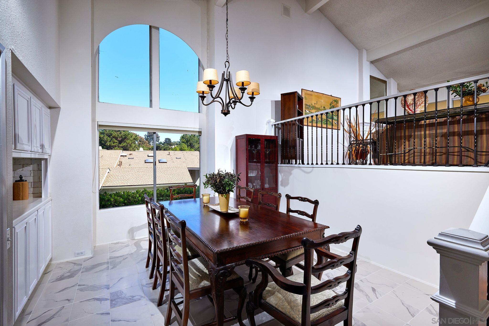 2035 Caminito Circulo Sur La Jolla, CA 92037 - Photo 9 of 22 a bathroom with a tub sink and mirror