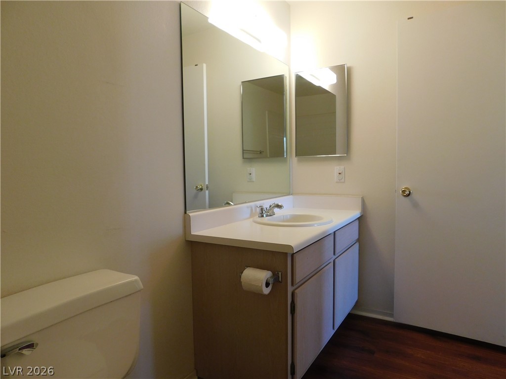 5221 South Lindell Road, Unit 202 Las Vegas, NV 89118 - Photo 20 of 28 Functional vanity with ample counter space and a sleek mirror elevate this essential space.