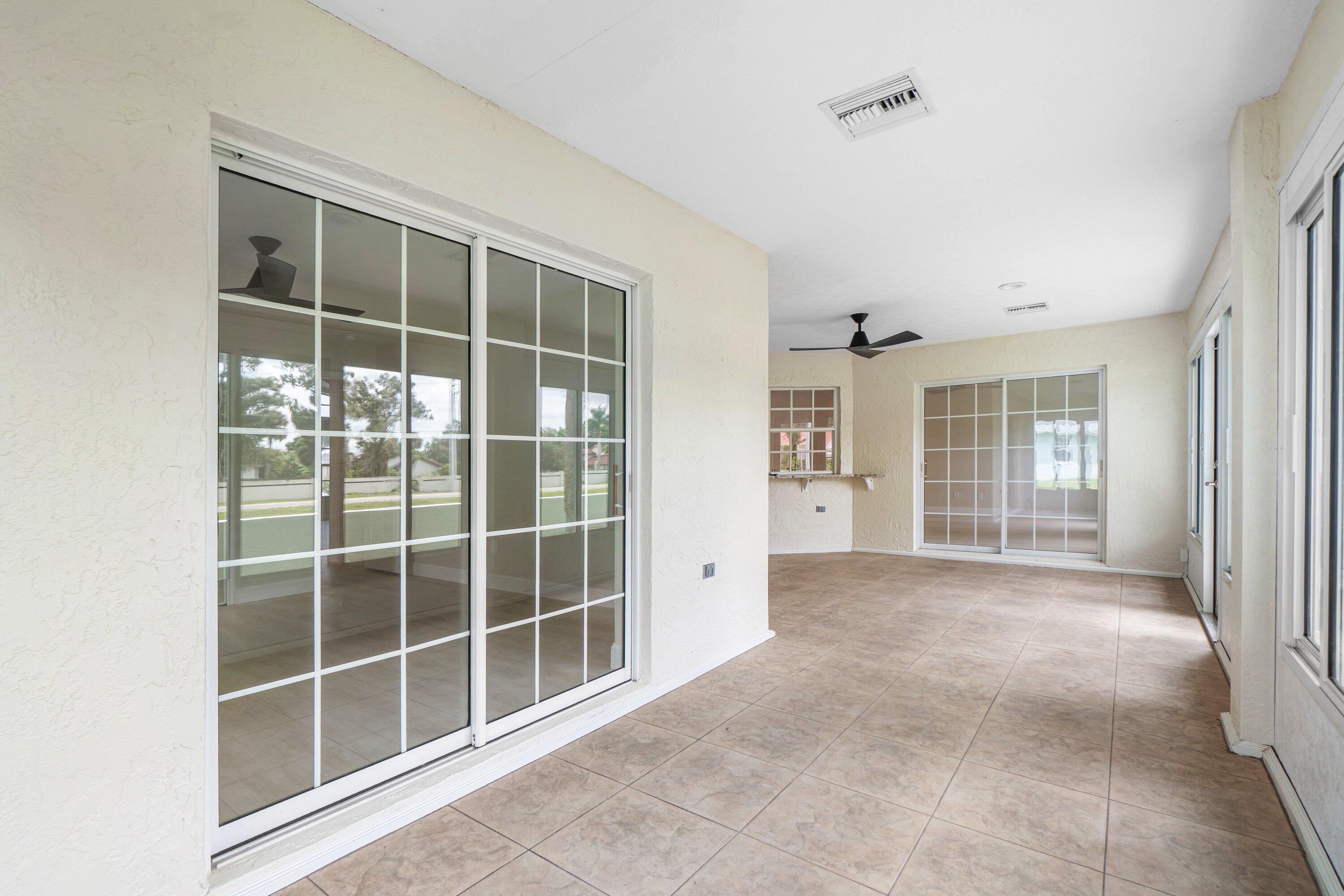 6807 Shelley Terrace Port St. Lucie, FL 34952 - Photo 14 of 34 a view of an empty room with a window