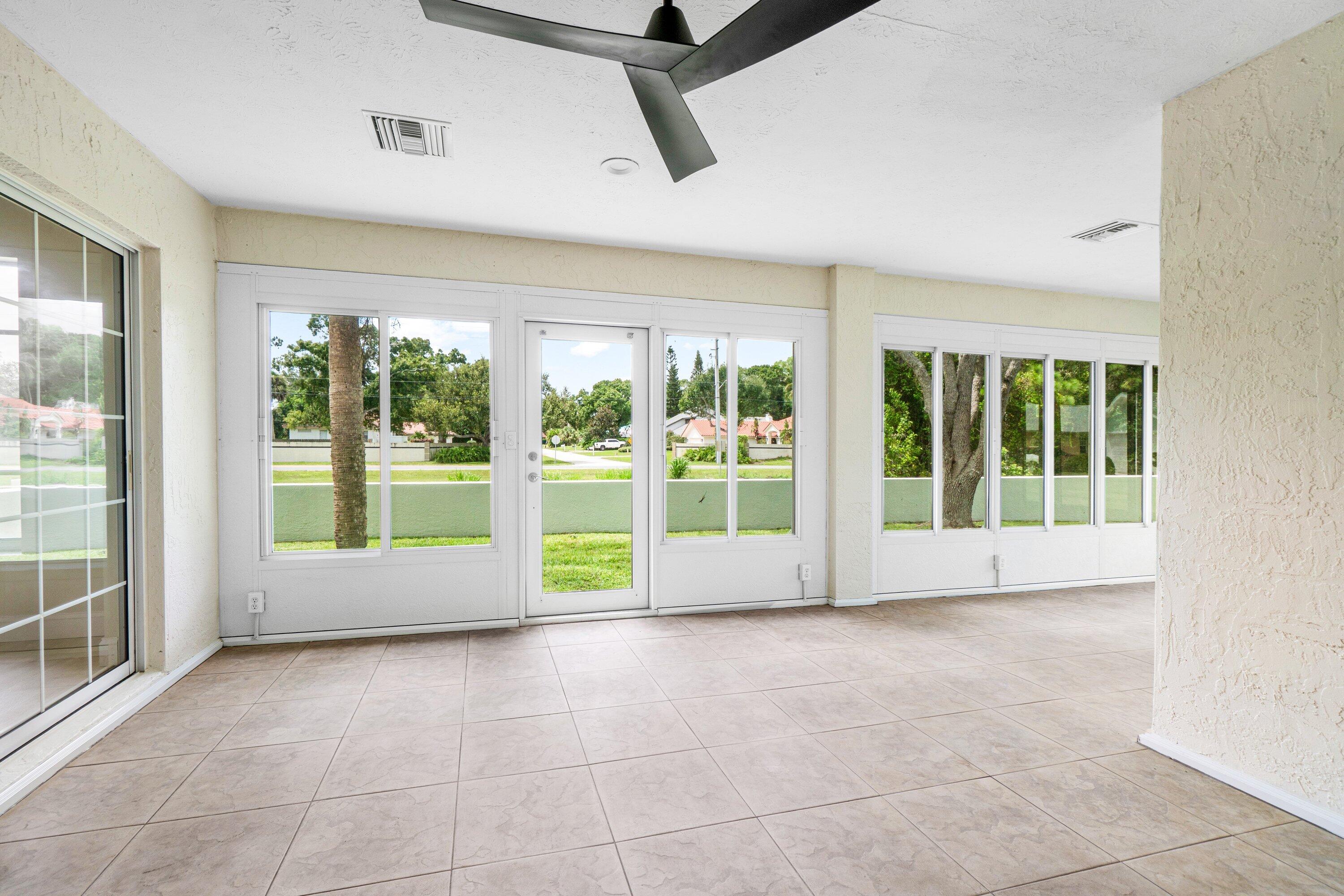 6807 Shelley Terrace Port St. Lucie, FL 34952 - Photo 15 of 34 a view of an empty room with windows