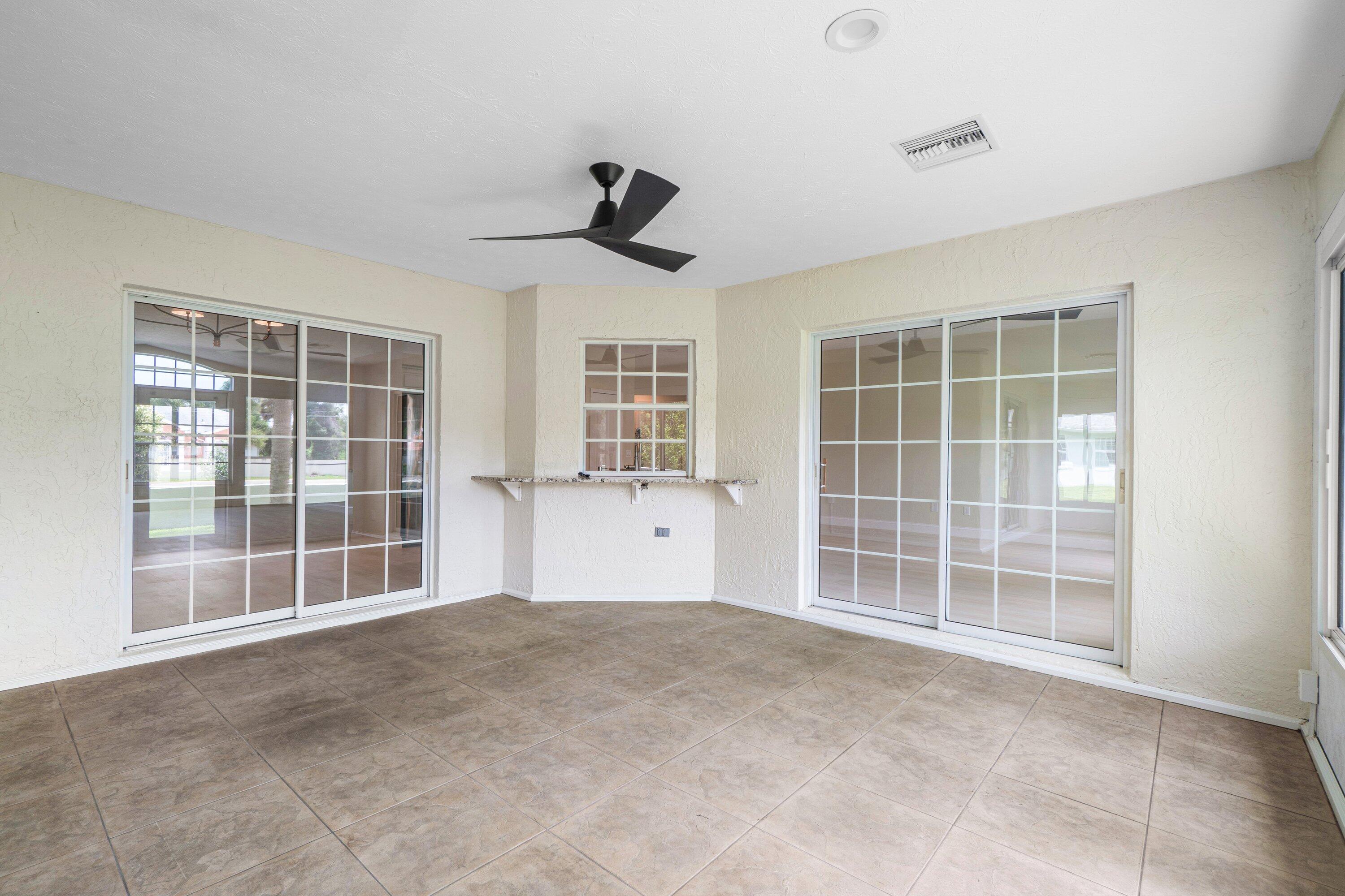 6807 Shelley Terrace Port St. Lucie, FL 34952 - Photo 16 of 34 a view of an empty room with a window