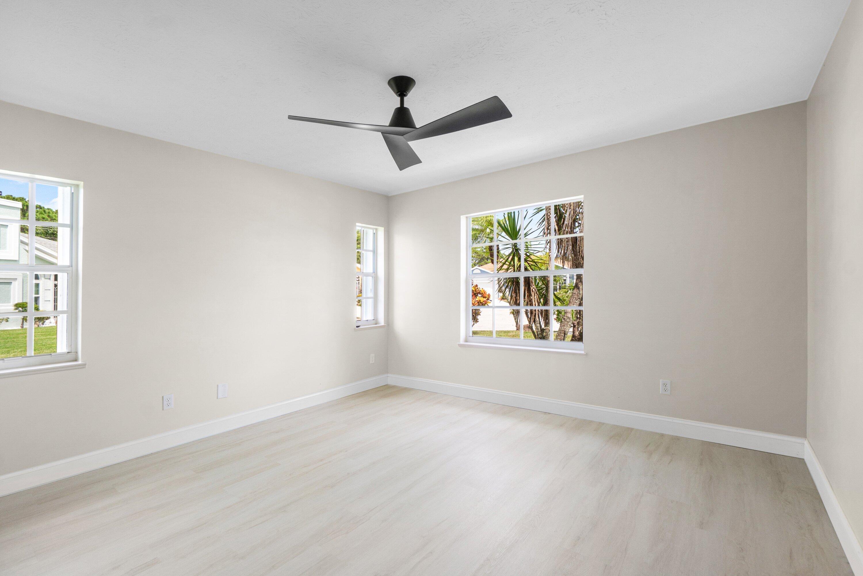 6807 Shelley Terrace Port St. Lucie, FL 34952 - Photo 18 of 34 a view of an empty room with a window