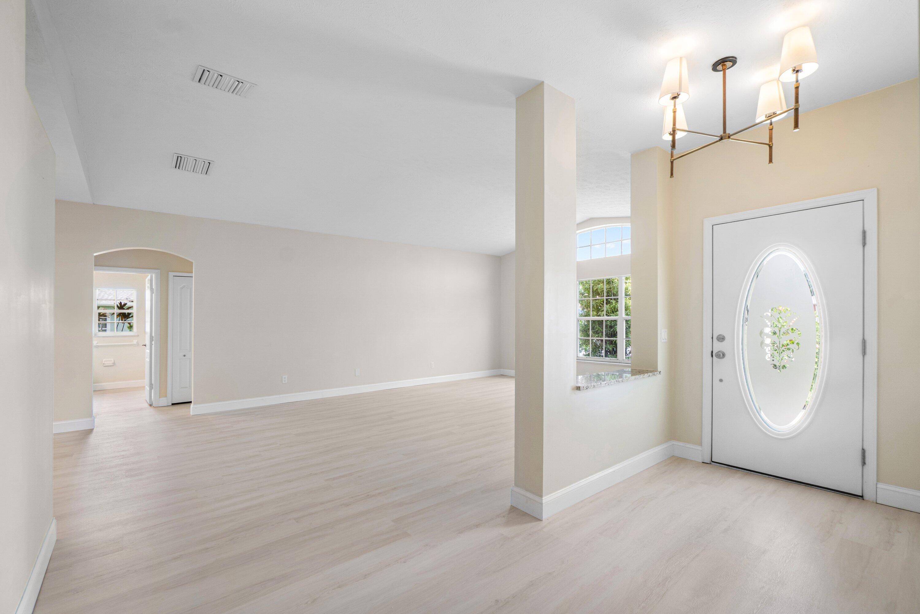 6807 Shelley Terrace Port St. Lucie, FL 34952 - Photo 2 of 34 a view of an empty room and window