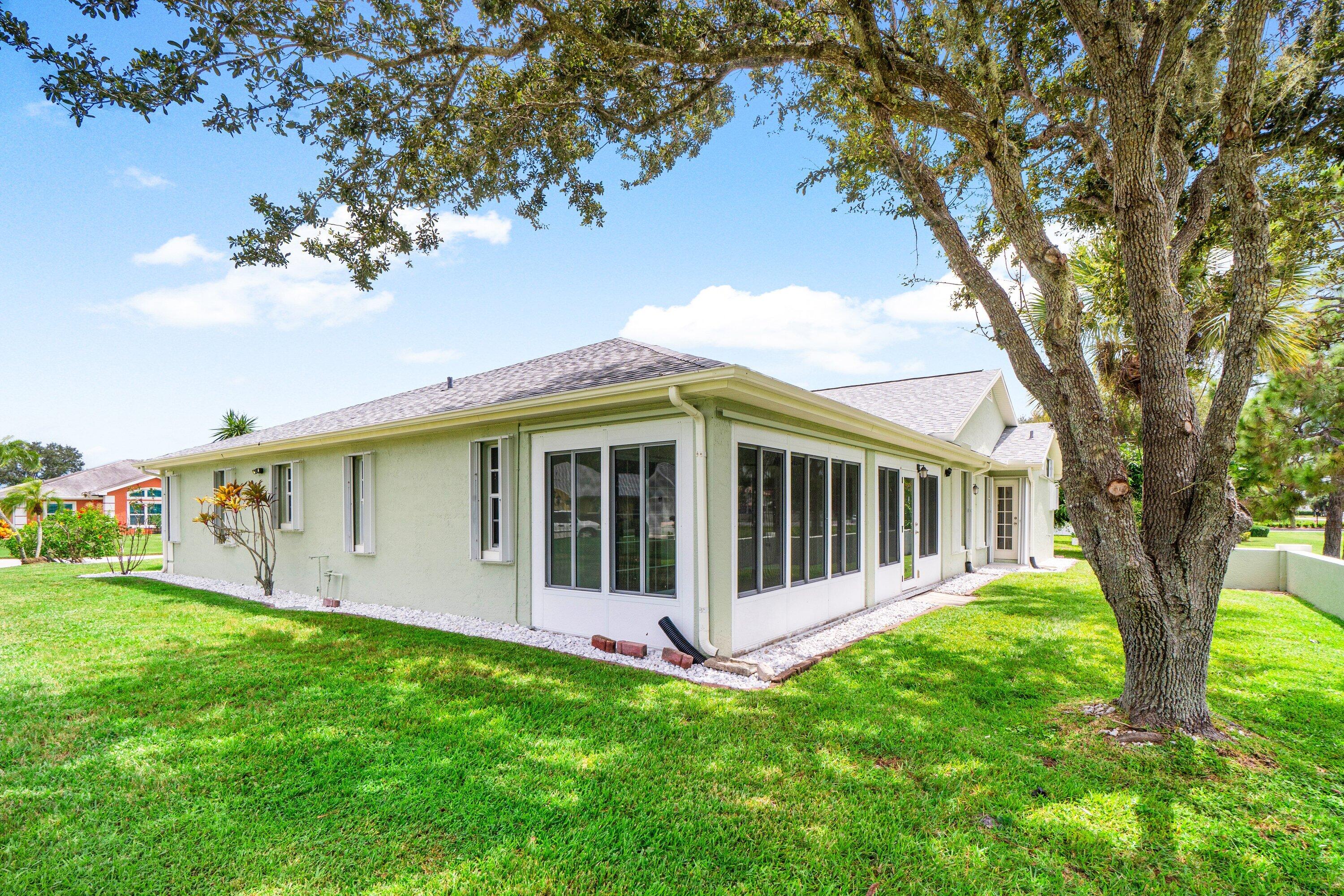 6807 Shelley Terrace Port St. Lucie, FL 34952 - Photo 32 of 34 a view of a house with backyard garden and garden
