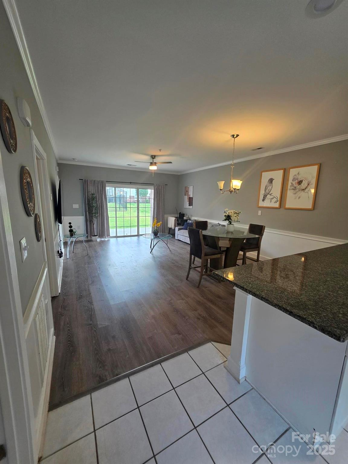 a lobby with furniture and floor to ceiling window