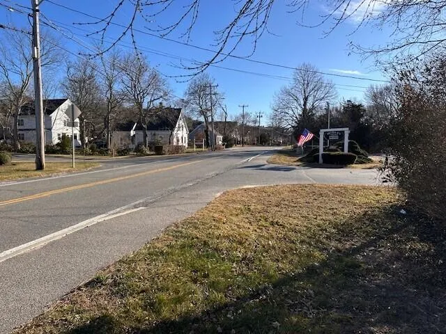 a view of a town with barn house