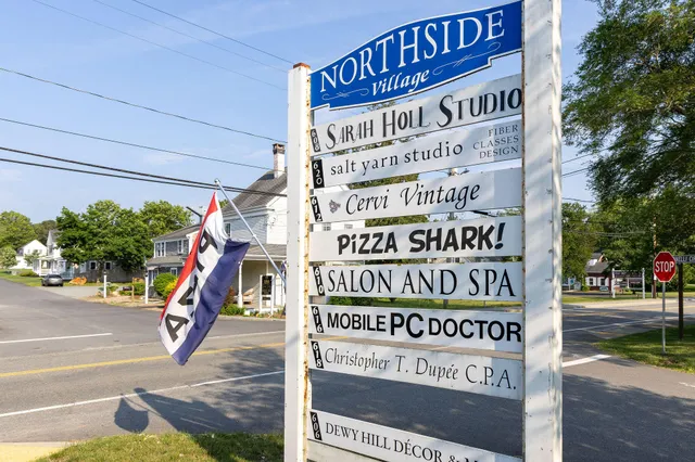 a sign on the side of a building