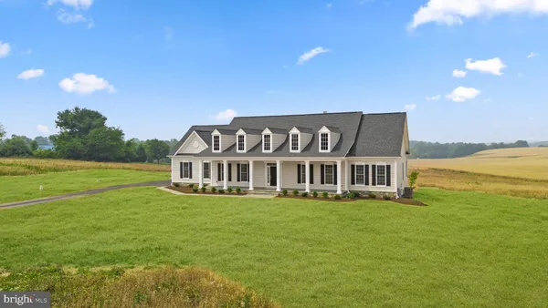 a view of a house with a big yard