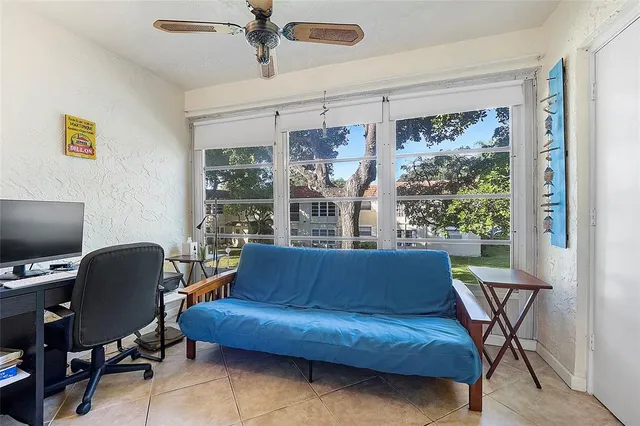 a living room with furniture and a window