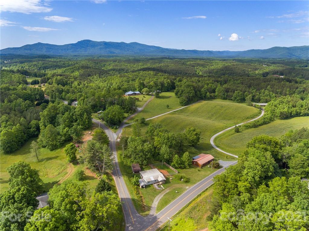 1373 Coopers Gap Road Mill Spring, NC 28756 - Photo 5 of 44 a view of a city