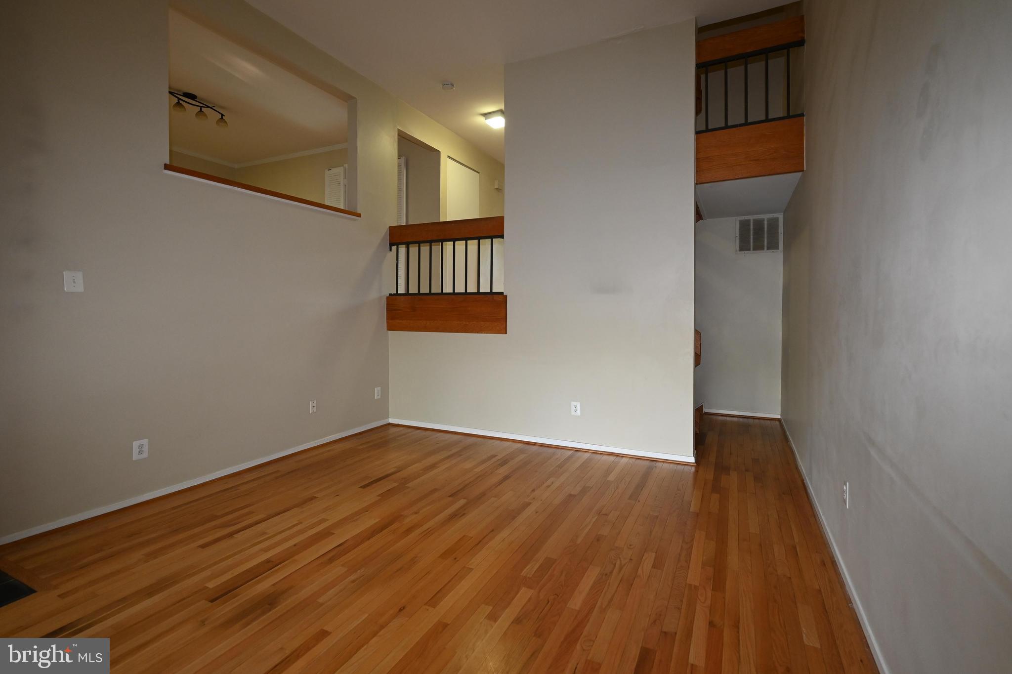 11768 Indian Ridge Road Reston, VA 20191 - Photo 34 of 57 a view of empty room with wooden floor