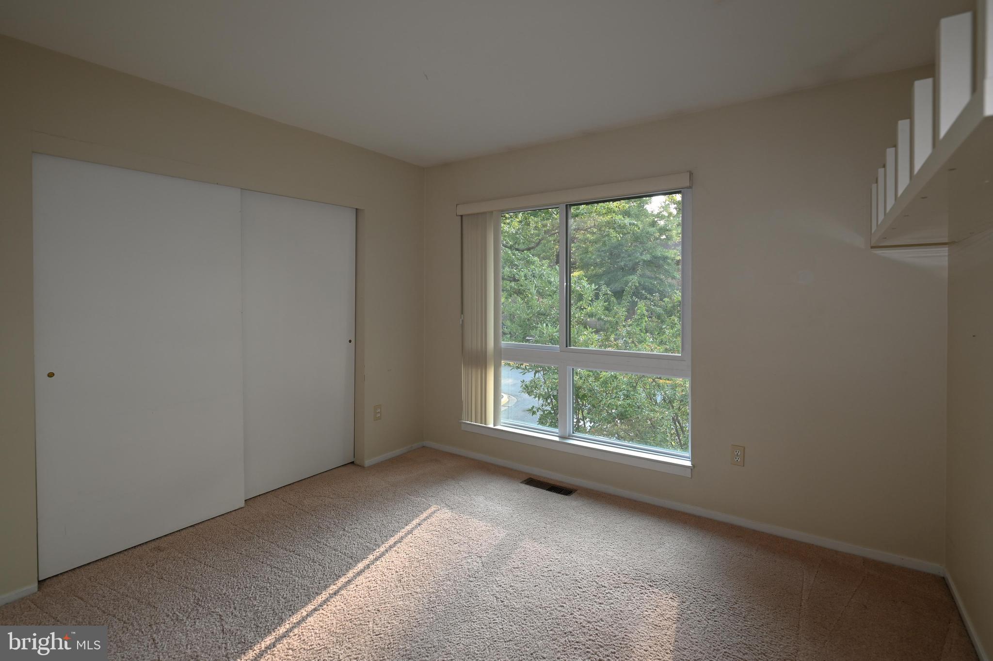 11768 Indian Ridge Road Reston, VA 20191 - Photo 39 of 57 a view of an empty room with a window