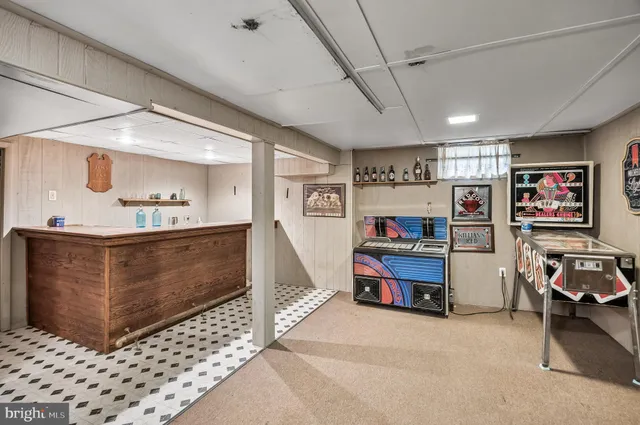 a utility room with lots of furniture and equipment