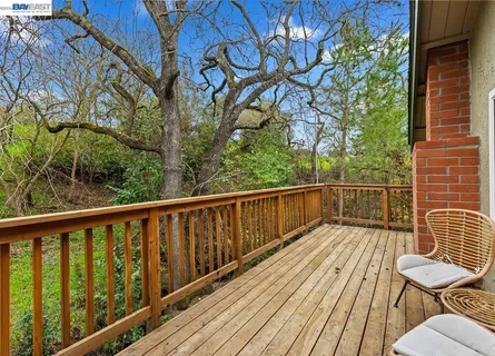 a view of a two chairs with wooden floor