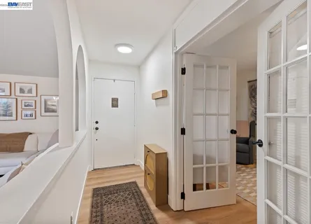a bathroom with a tub shower and sink