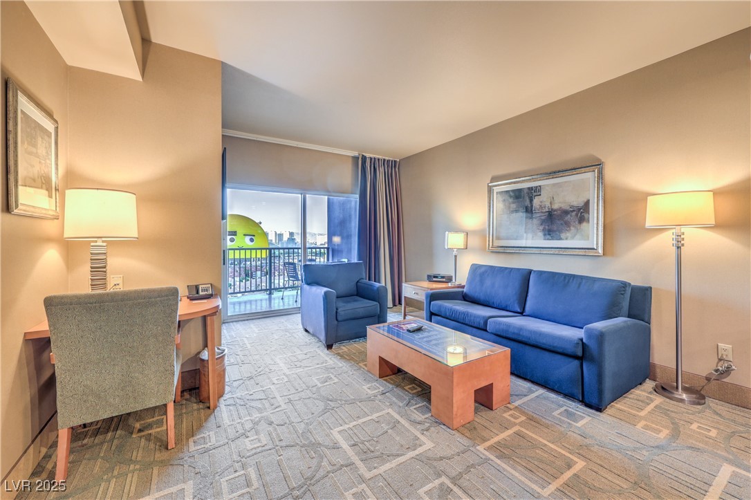 211 East Flamingo Road, Unit 1505 Las Vegas, NV 89169 - Photo 11 of 45 Living room with carpet floors