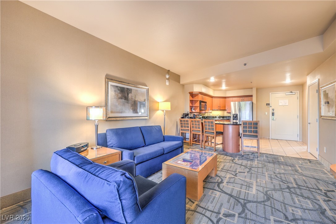 211 East Flamingo Road, Unit 1505 Las Vegas, NV 89169 - Photo 14 of 45 Living area with baseboards