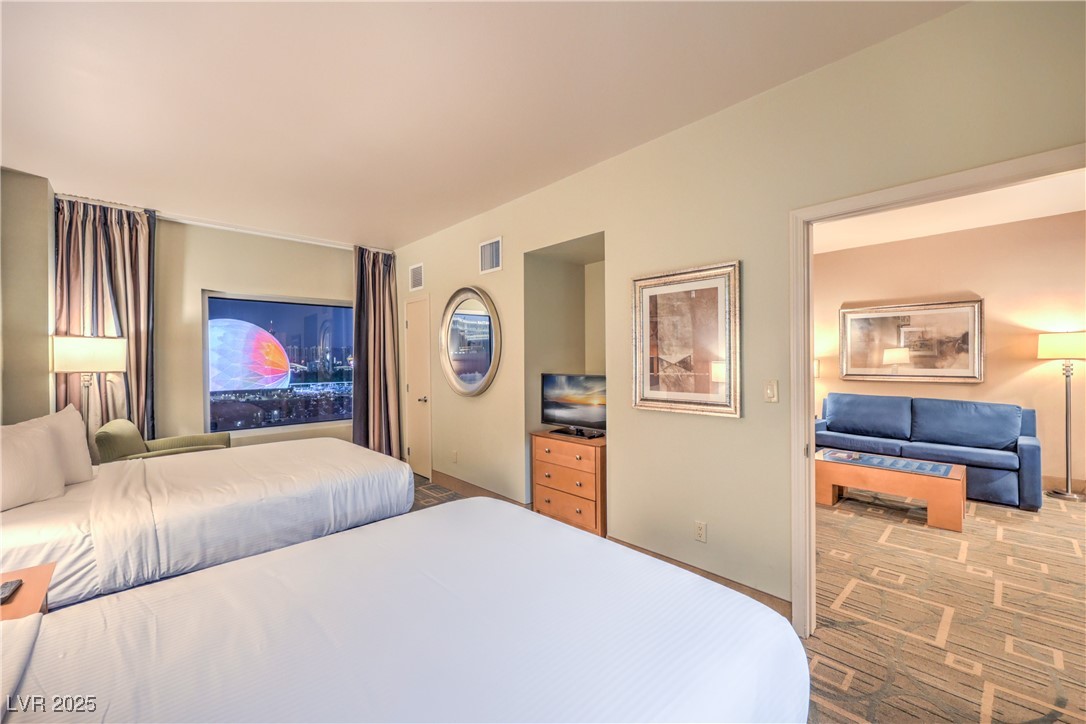 211 East Flamingo Road, Unit 1505 Las Vegas, NV 89169 - Photo 17 of 45 View of carpeted bedroom