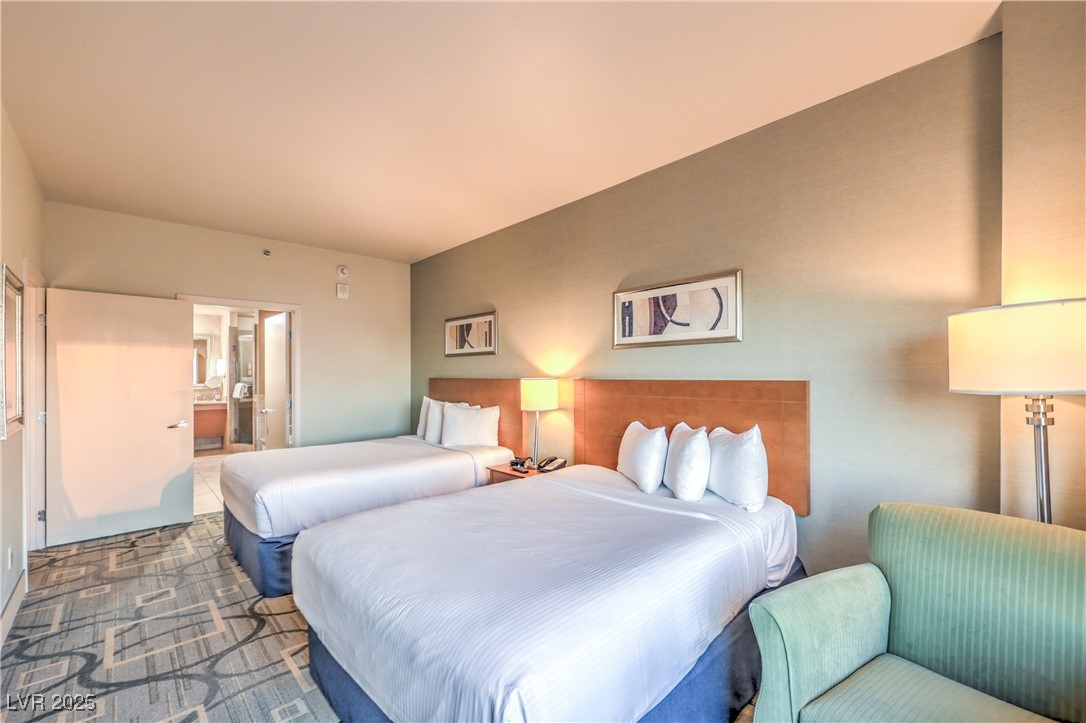 211 East Flamingo Road, Unit 1505 Las Vegas, NV 89169 - Photo 19 of 45 Bedroom with ensuite bath