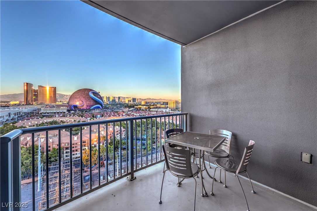 211 East Flamingo Road, Unit 1505 Las Vegas, NV 89169 - Photo 25 of 45 Balcony at dusk with a city view