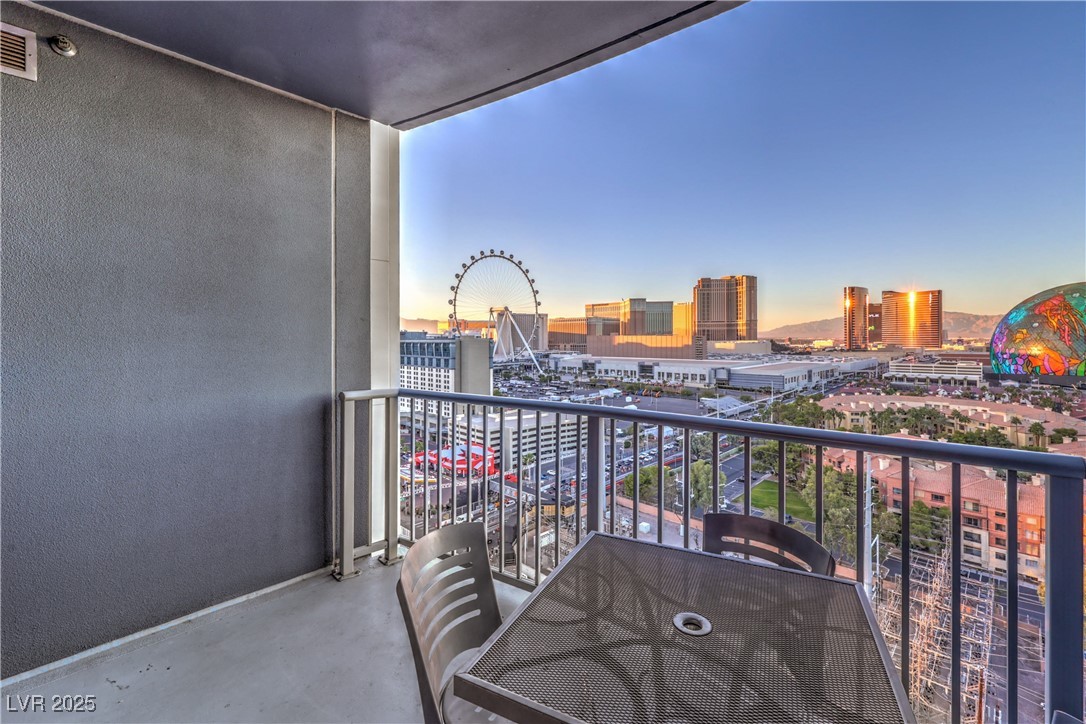 211 East Flamingo Road, Unit 1505 Las Vegas, NV 89169 - Photo 28 of 45 Balcony at dusk with a city view