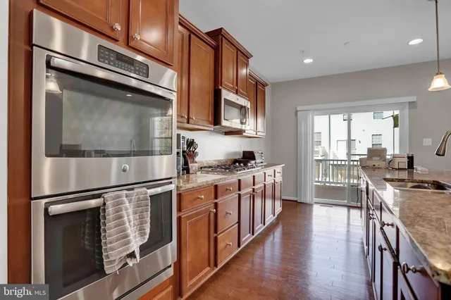 a view of bathroom with a toilet sink and a window