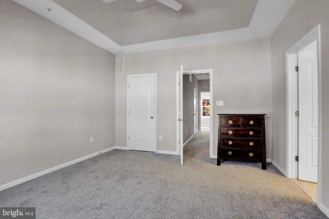 a bathroom with a double vanity sink toilet and shower
