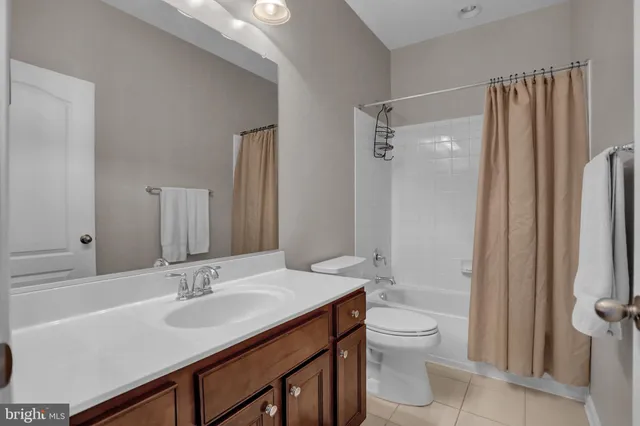 a view of an empty room with windows