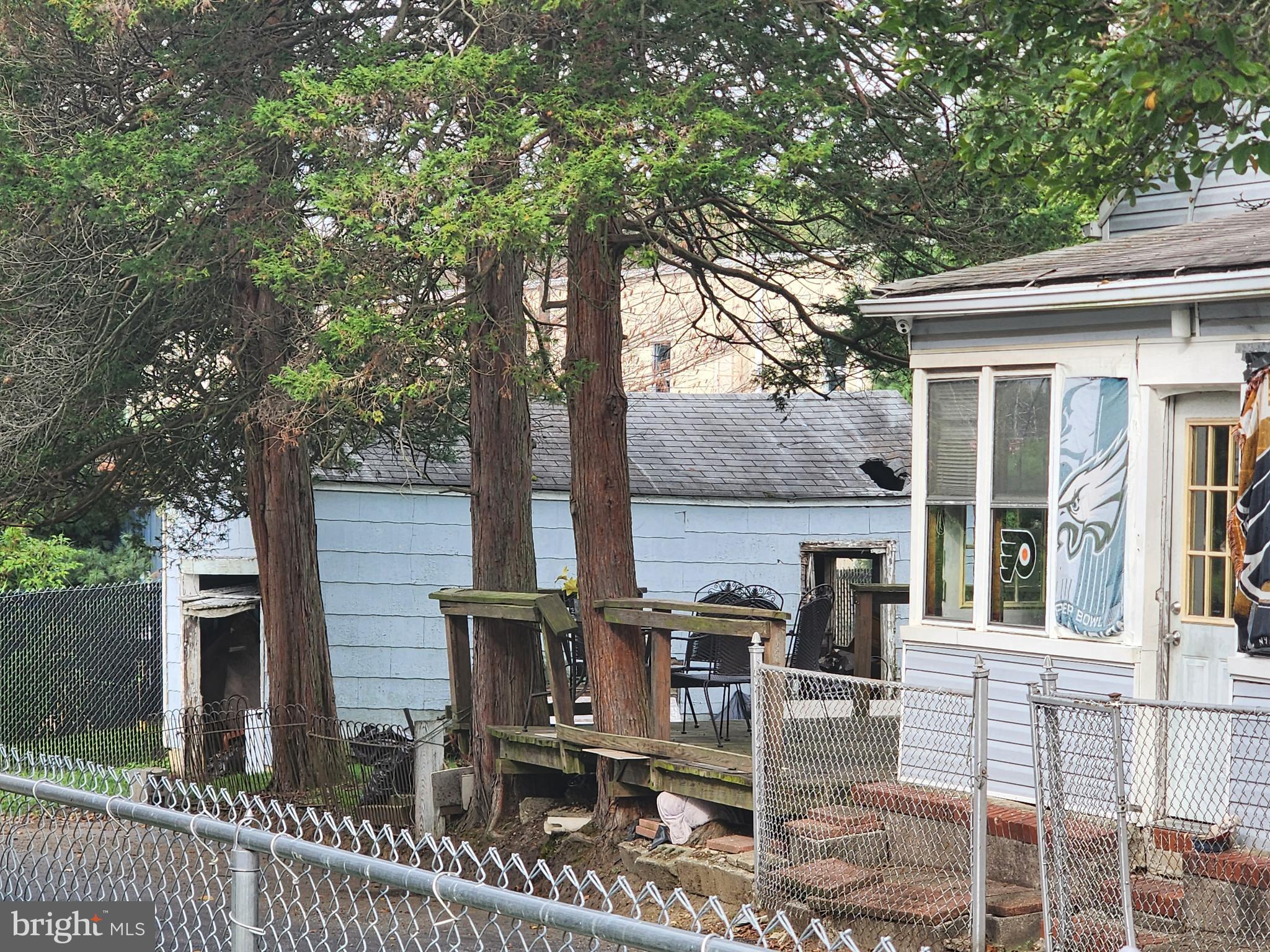 924 Chestnut Street Trainer, PA 19061 - Photo 4 of 4 a view of a chair and tables in the balcony