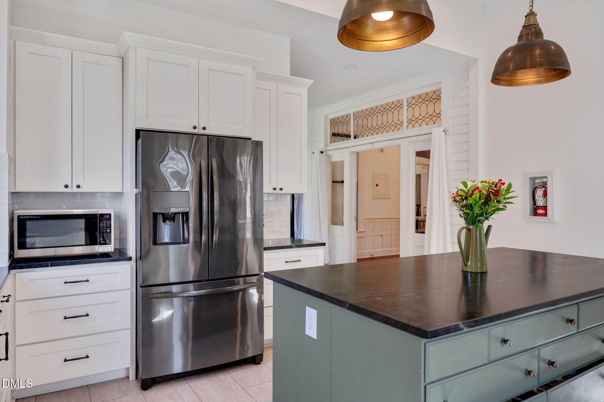 2239 Barber Mill Road Clayton, NC 27520 - Photo 19 of 75 a kitchen with stainless steel appliances granite countertop a refrigerator a stove and a sink