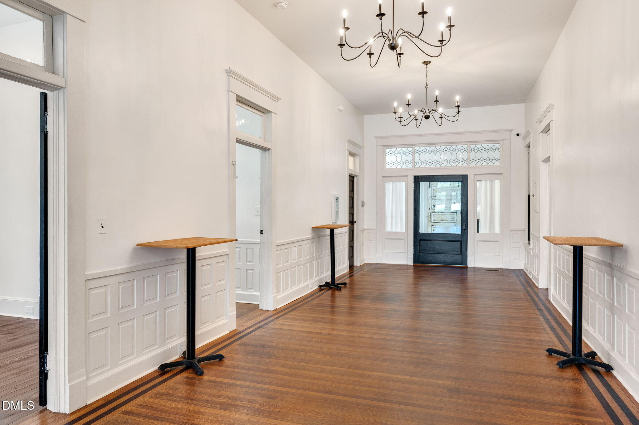 2239 Barber Mill Road Clayton, NC 27520 - Photo 25 of 75 a view of a hallway with wooden floor and staircase
