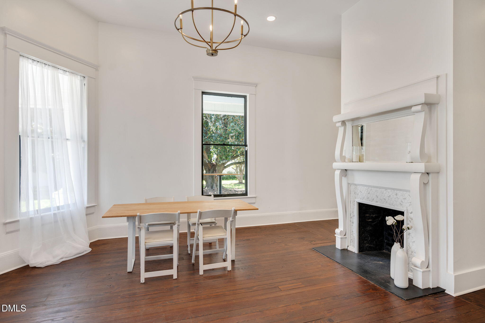 2239 Barber Mill Road Clayton, NC 27520 - Photo 28 of 75 a view of a livingroom with furniture window and wooden floor